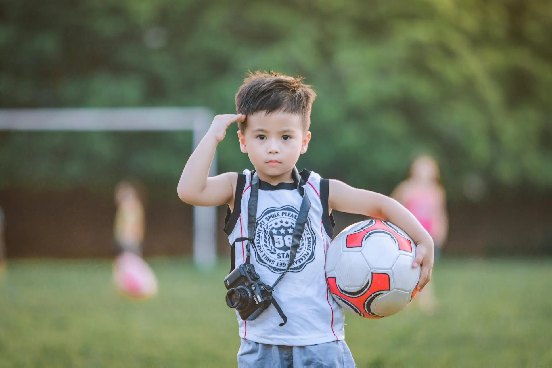 Kid playing ball game